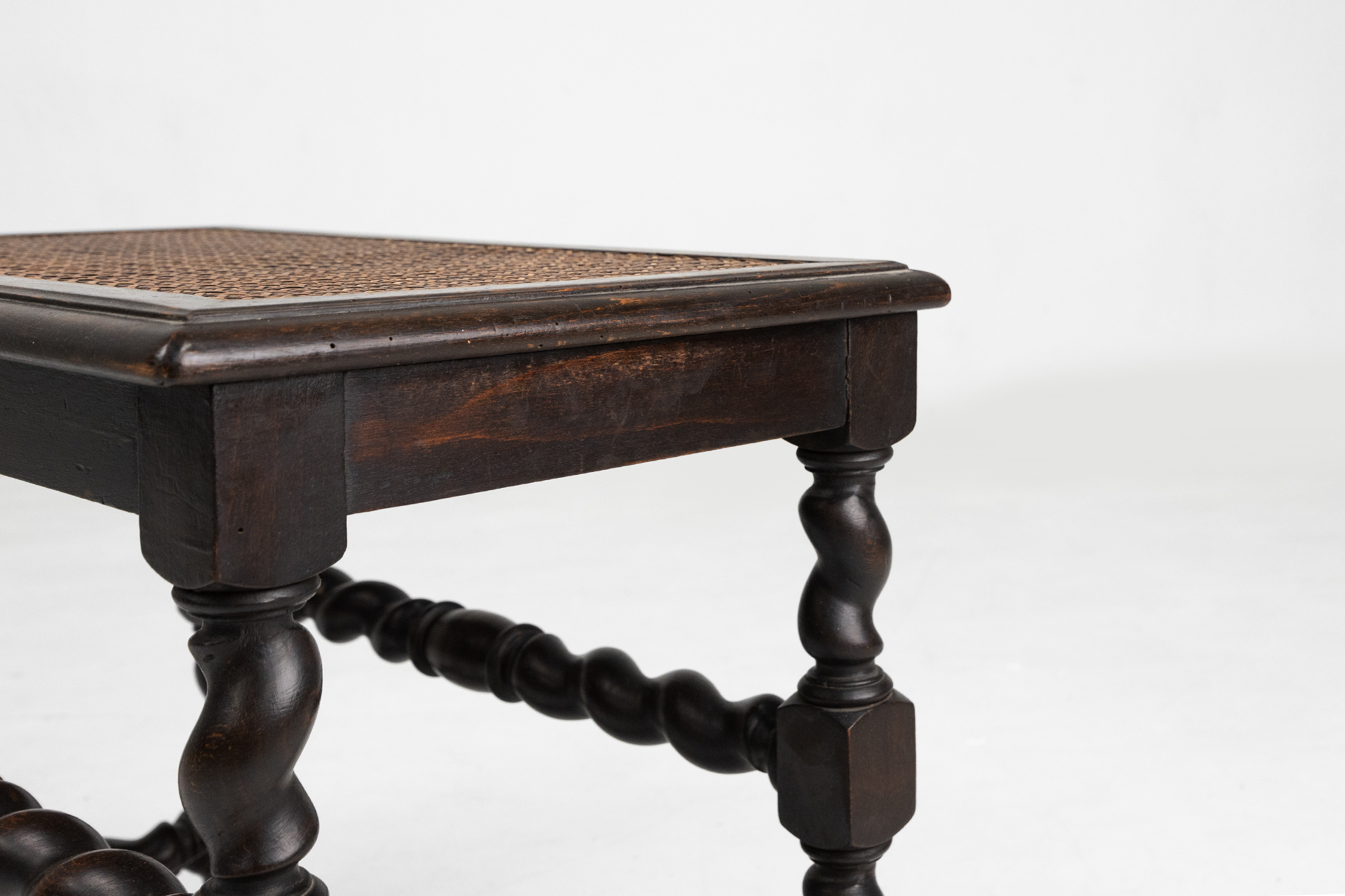 Antique French wooden stool with rattan top, ca. 1880 thumbnail